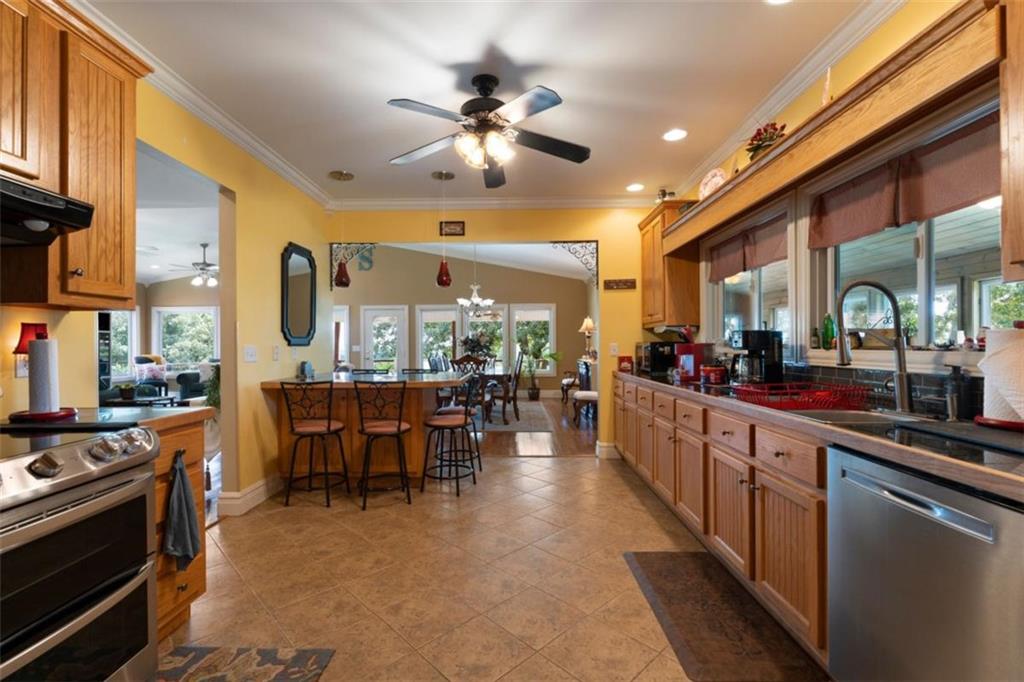 300 Ellis Road Southeast Rome, GA 30161 - Photo 20 of 46 a large kitchen with a table and chairs