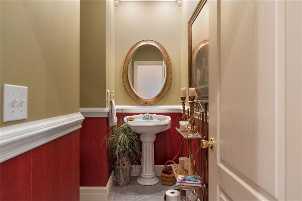 300 Ellis Road Southeast Rome, GA 30161 - Photo 21 of 46 a bathroom with a sink and a mirror