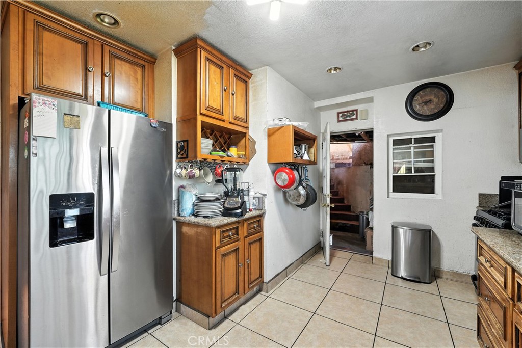 6178 Roy Street Los Angeles, CA 90042 - Photo 16 of 44 Through kitchen door you see stairs that lead you to Studio