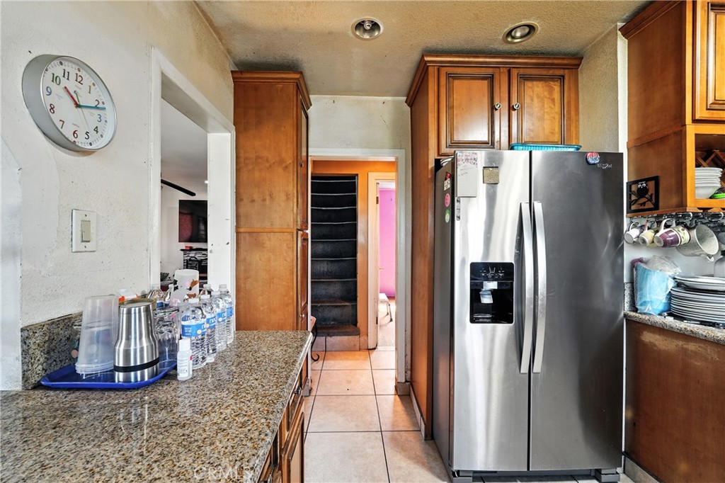 6178 Roy Street Los Angeles, CA 90042 - Photo 18 of 44 From this angle of the kitchen you can see the stairs that lead to its Loft