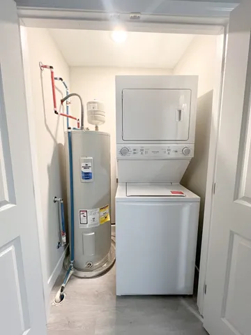 a room with water heater and storage
