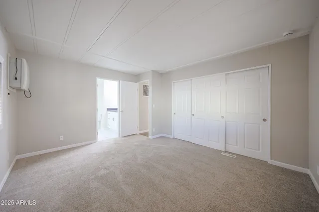 a view of an empty room and window