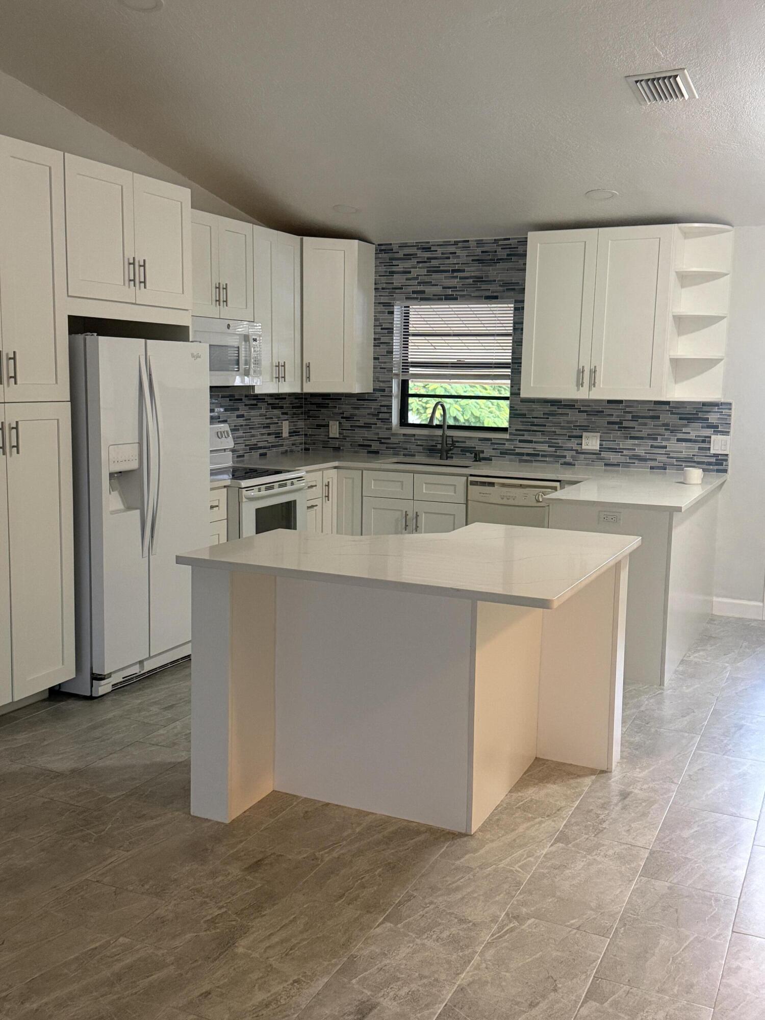 3011 Southeast Aster Lane, Unit 810 Stuart, FL 34994 - Photo 5 of 15 kitchen