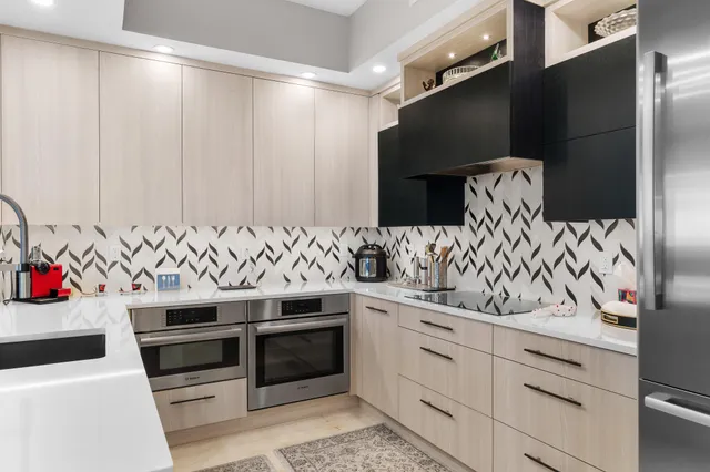 a bathroom with a sink a bathtub and a toilet