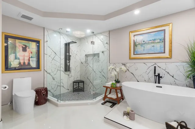 a living room with a couch and a dresser with wooden floor