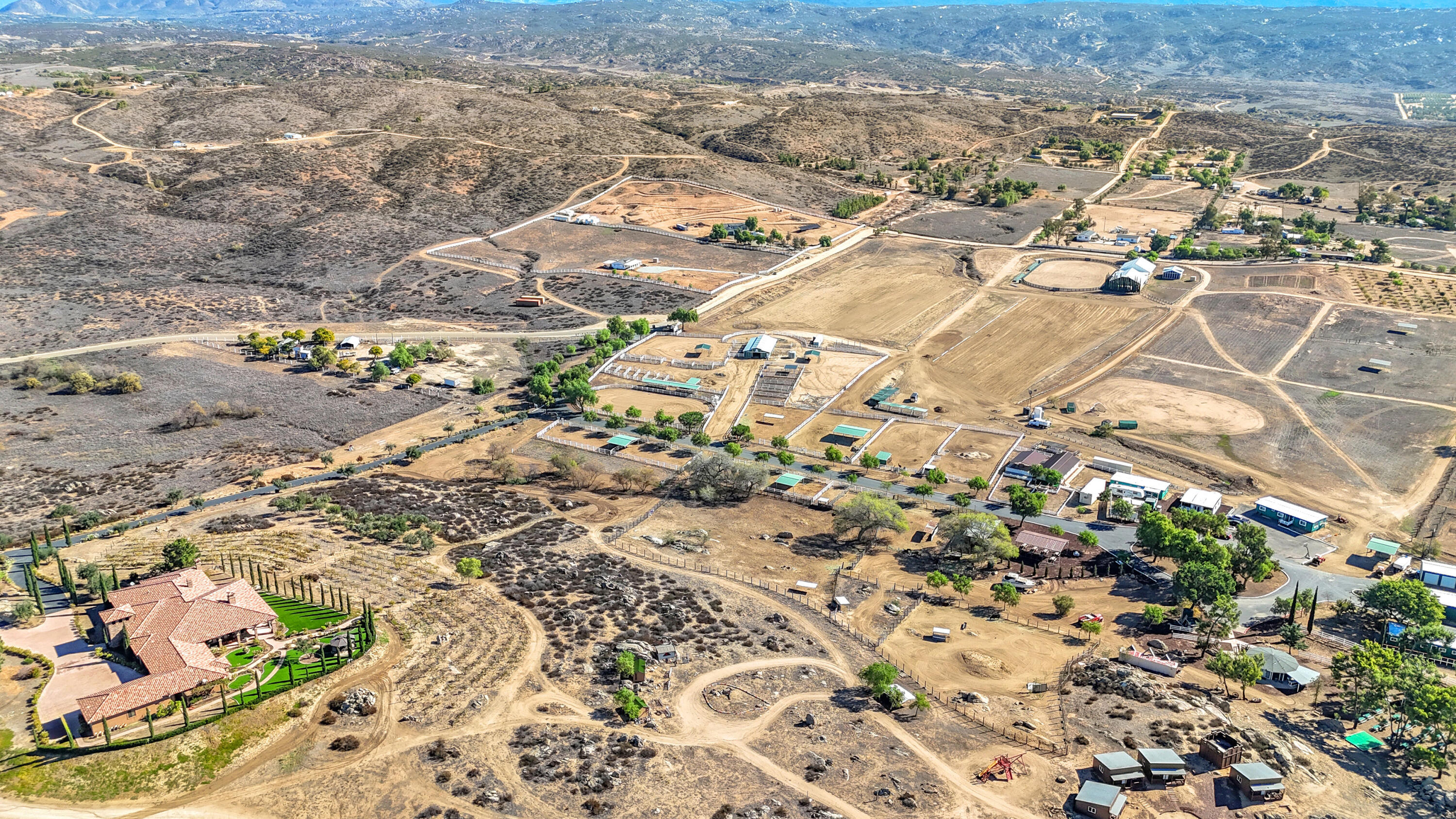 39345 San Ignacio Road Hemet, CA 92544 - Photo 104 of 110 an aerial view of residential houses with outdoor space