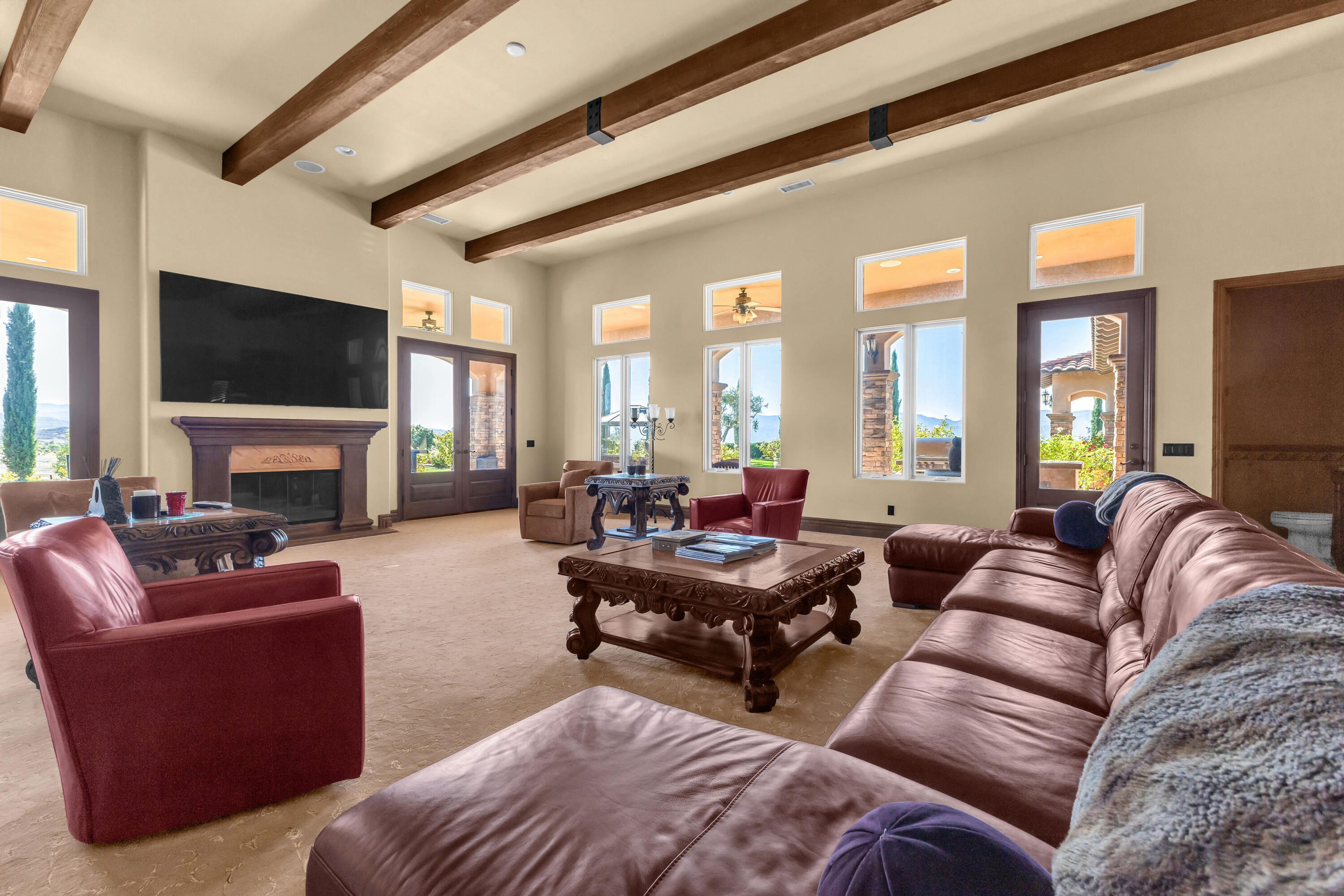 39345 San Ignacio Road Hemet, CA 92544 - Photo 17 of 110 a living room with furniture a fireplace and a flat screen tv