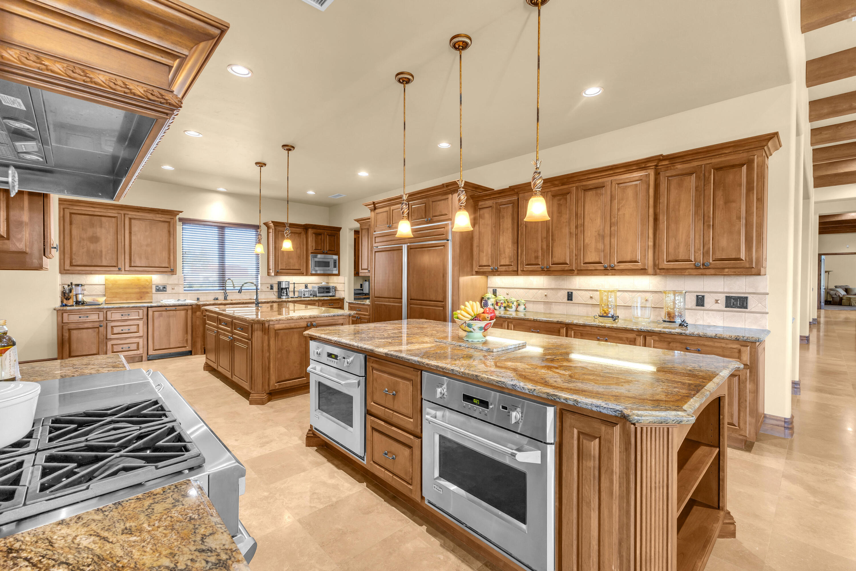 39345 San Ignacio Road Hemet, CA 92544 - Photo 27 of 110 a kitchen with stainless steel appliances granite countertop a stove and a sink