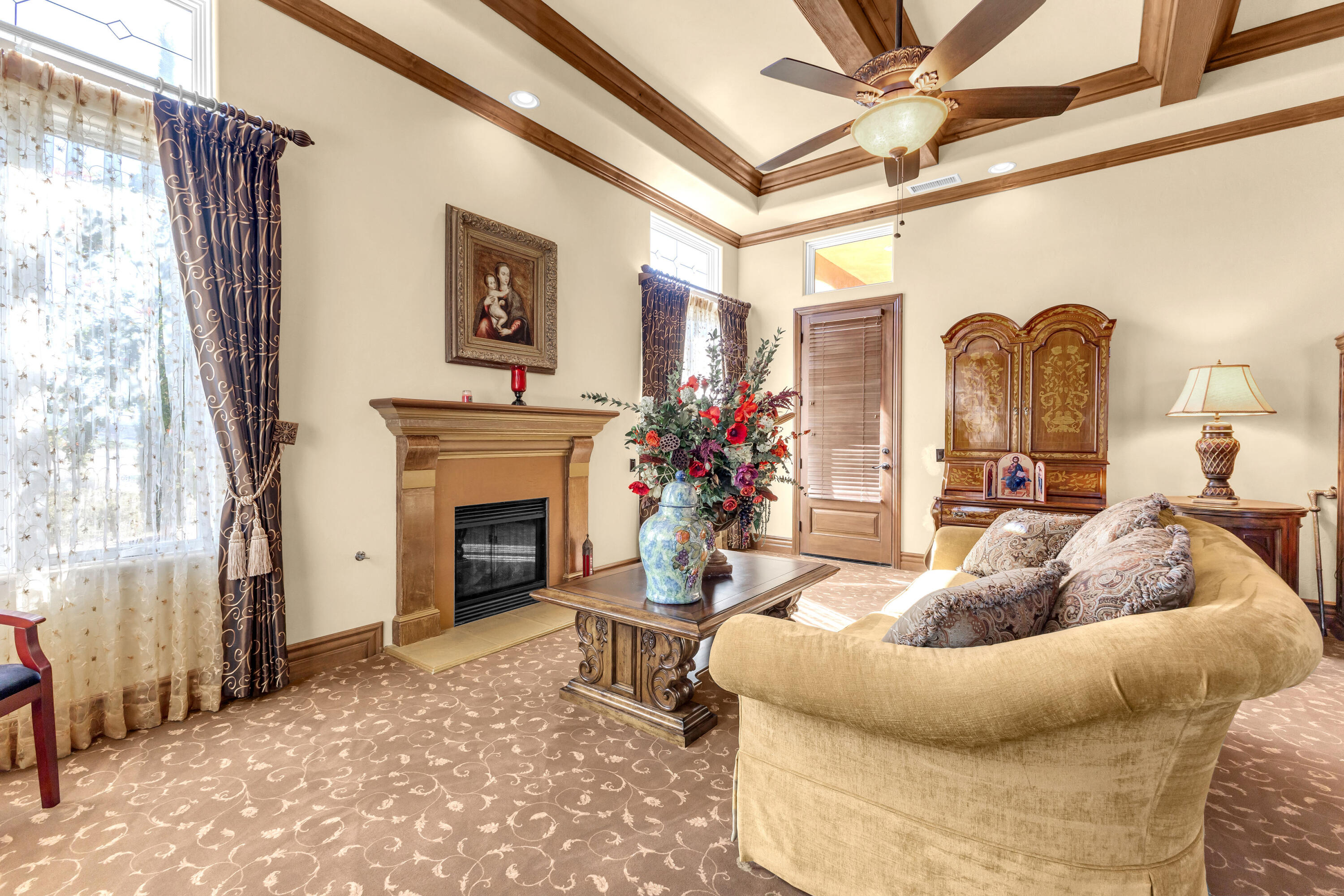 39345 San Ignacio Road Hemet, CA 92544 - Photo 53 of 110 a living room with furniture a fireplace and a large window