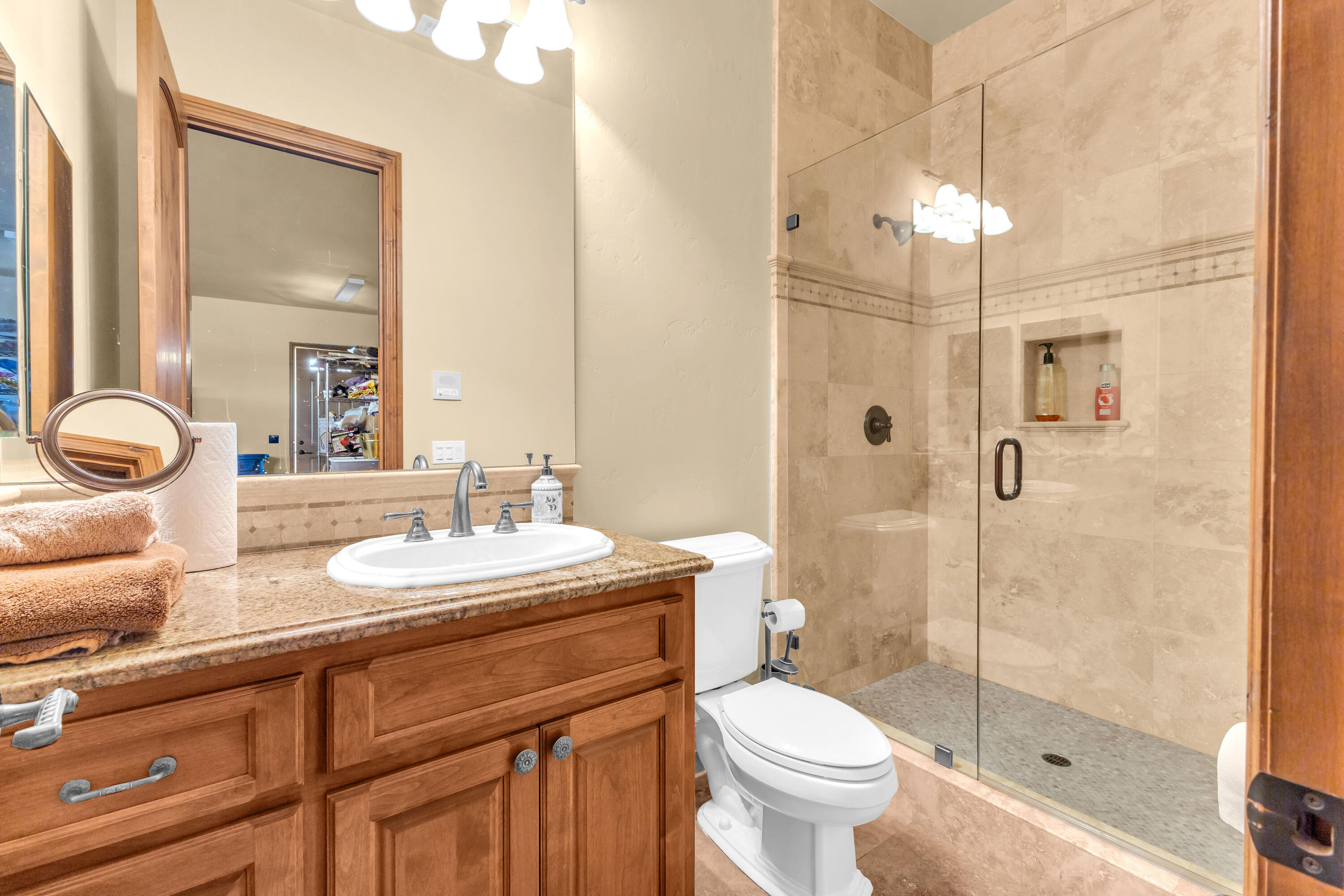 39345 San Ignacio Road Hemet, CA 92544 - Photo 71 of 110 a bathroom with a sink a toilet and shower