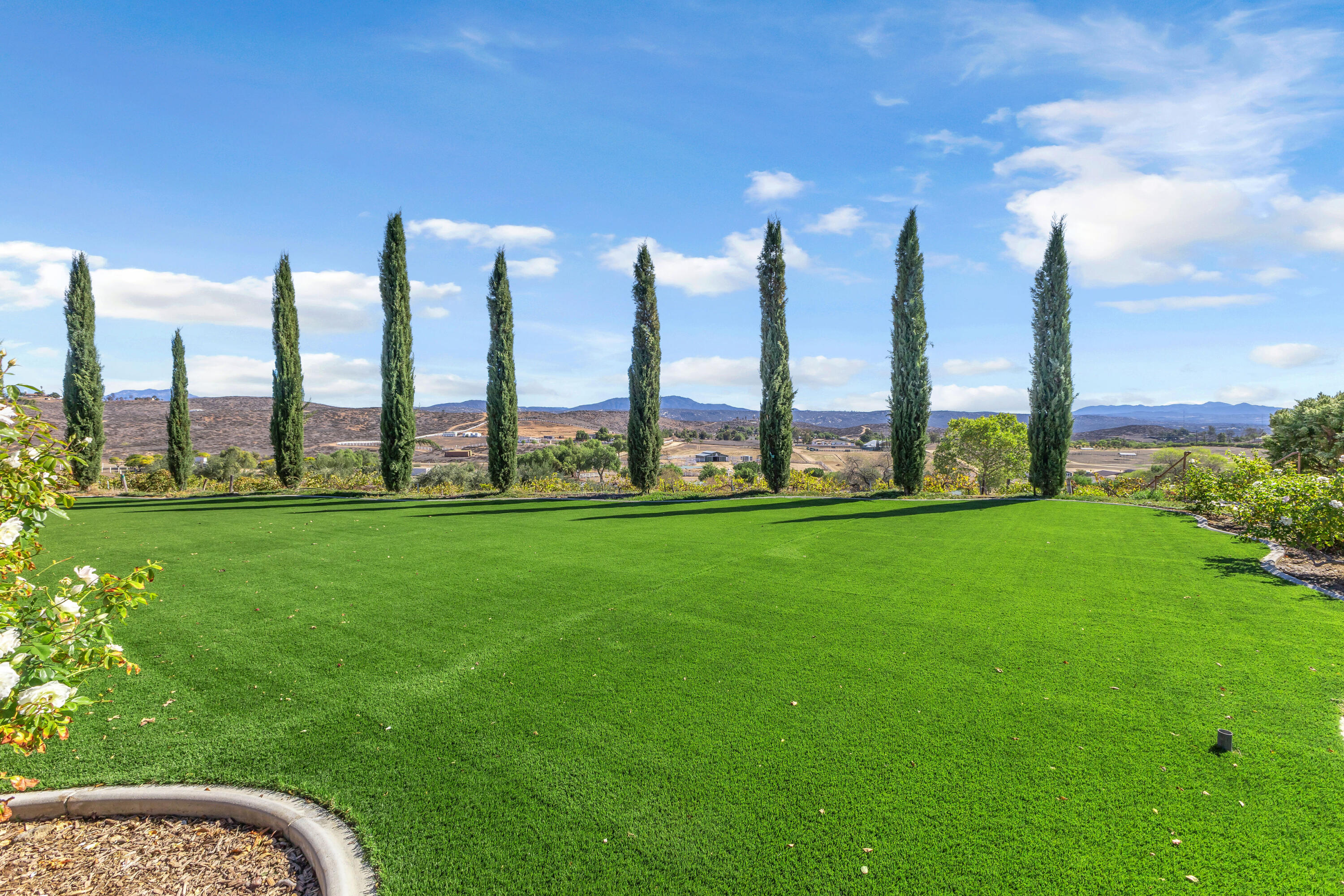 39345 San Ignacio Road Hemet, CA 92544 - Photo 77 of 110 a view of a city with tall buildings