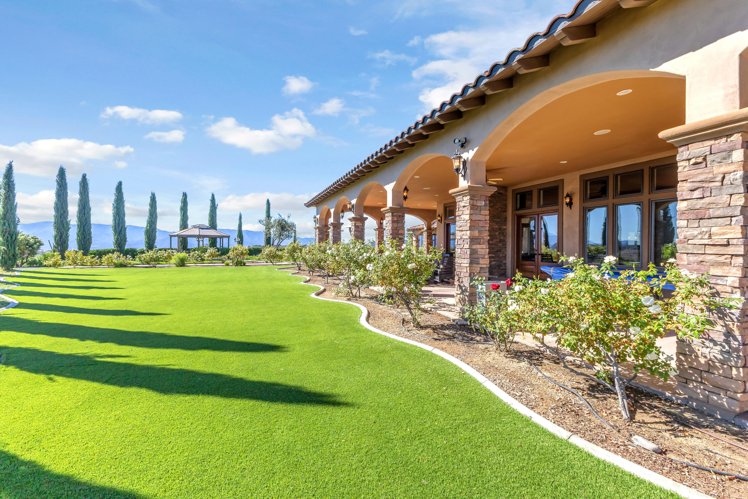 39345 San Ignacio Road Hemet, CA 92544 - Photo 86 of 110 a swimming pool with outdoor seating and yard