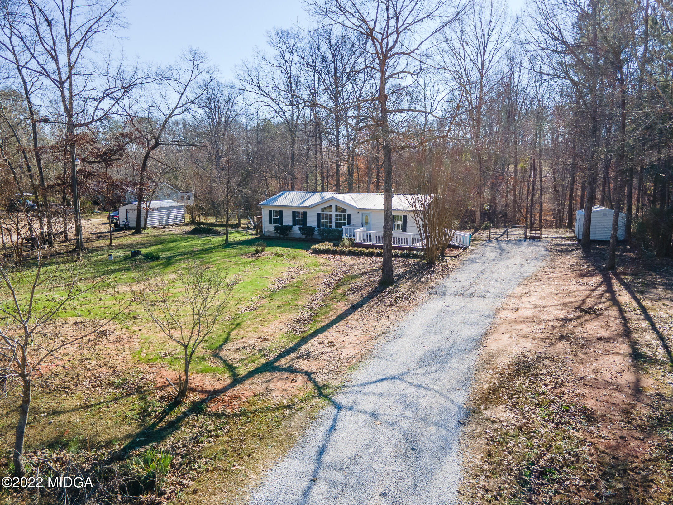 170 Arrow Point Road Jackson, GA 30233 - Photo 3 of 37 a view of a backyard with a snow