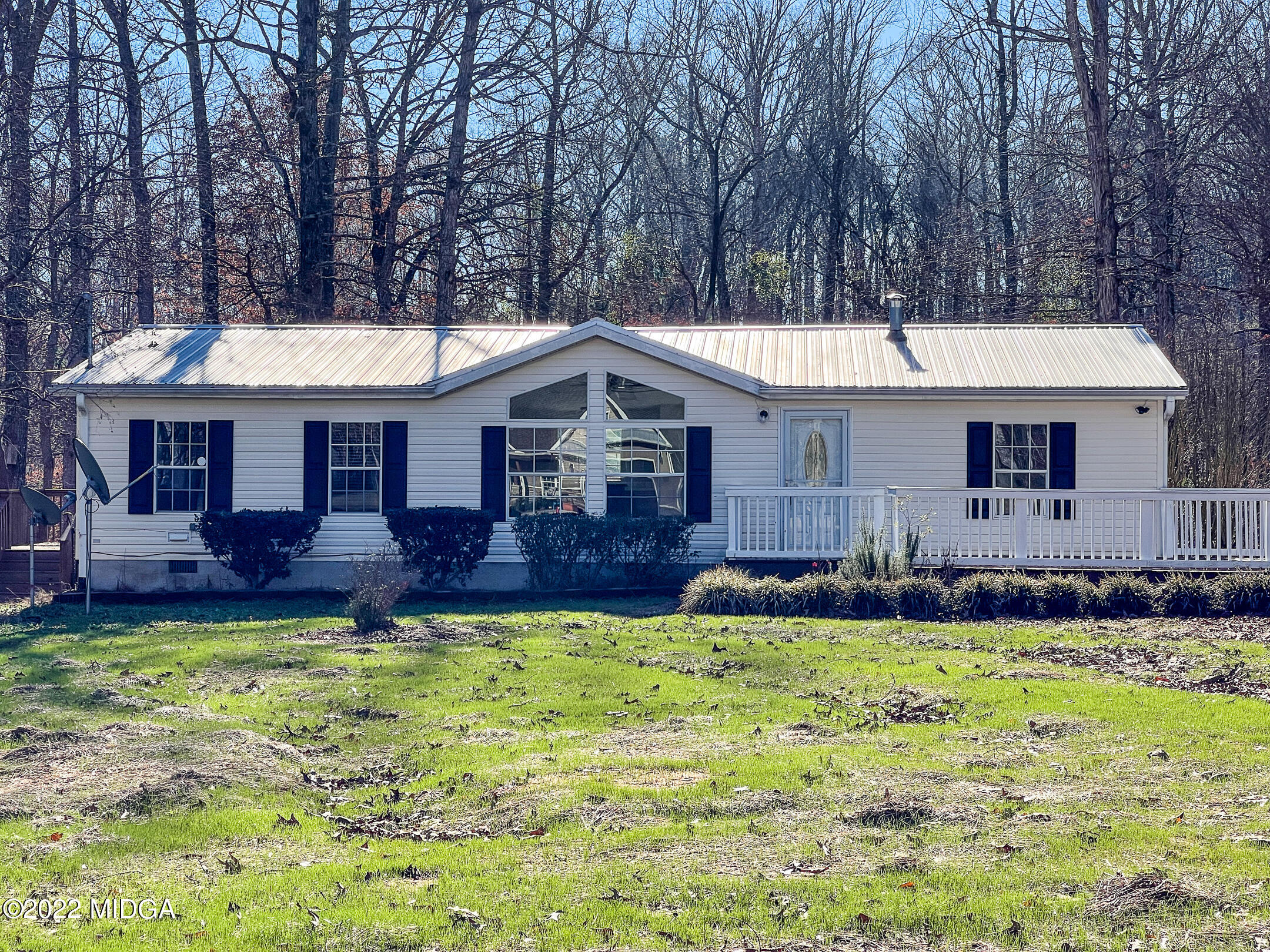 170 Arrow Point Road Jackson, GA 30233 - Photo 31 of 37 a front view of a house with a garden