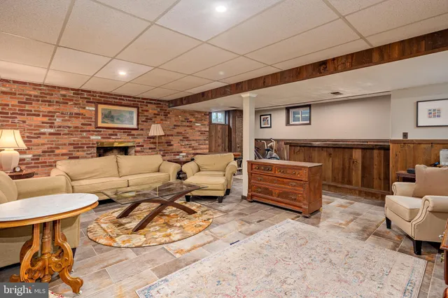 a living room with furniture and a couch