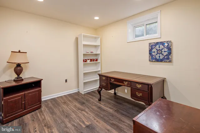 a room with furniture and wooden floor