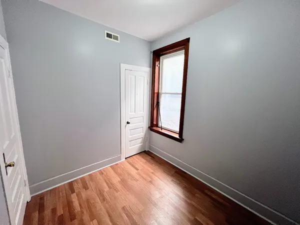 a view of an empty room and window