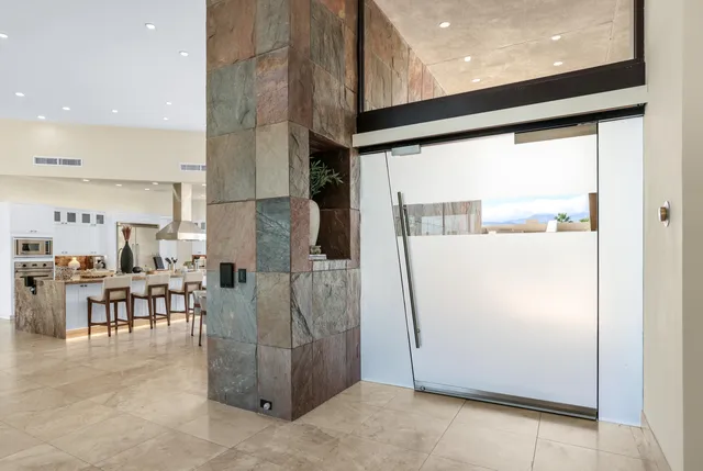 a living room with furniture and a table