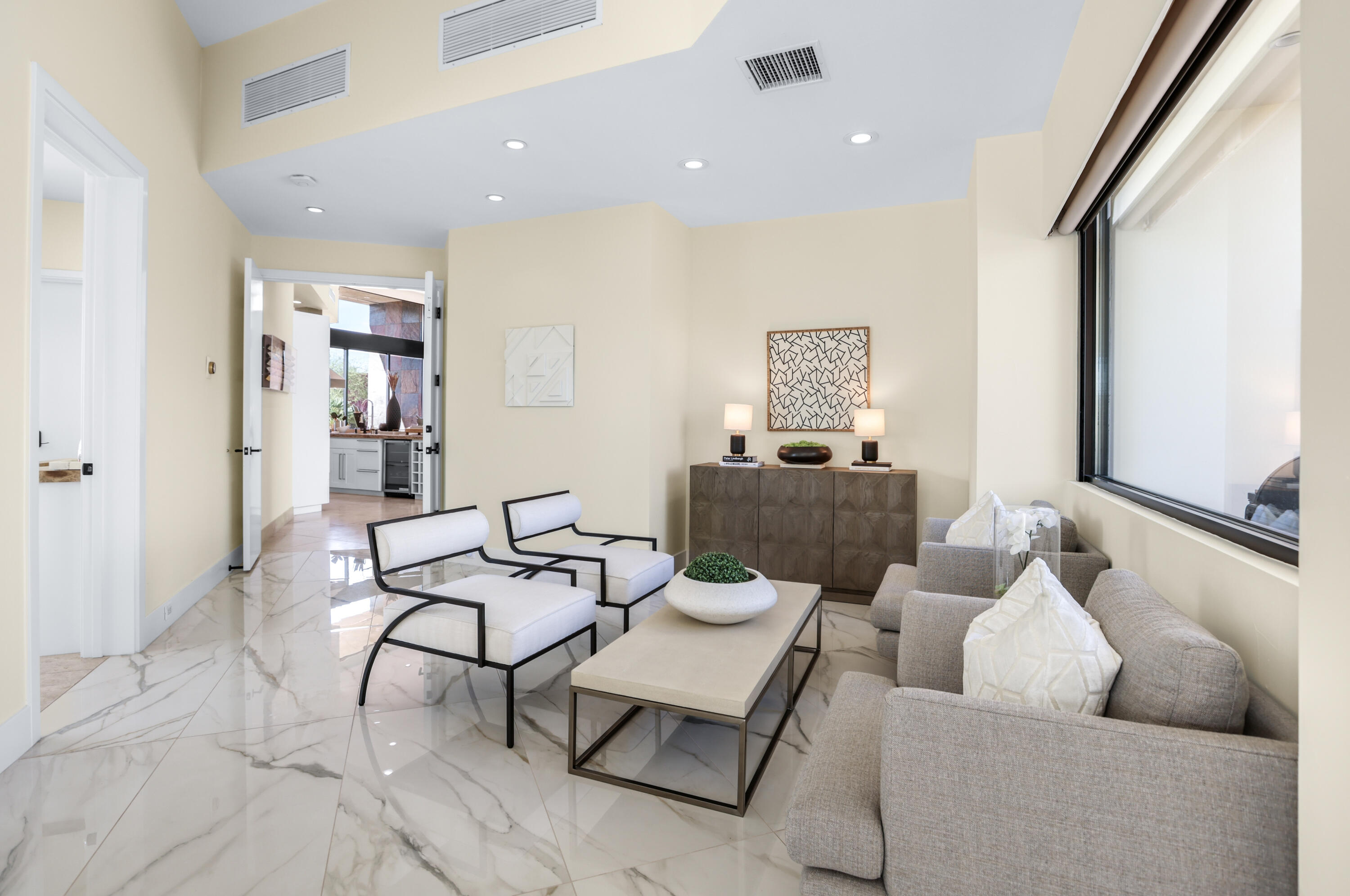 1 Seclude Court Rancho Mirage, CA 92270 - Photo 23 of 52 a living room with furniture and a couch