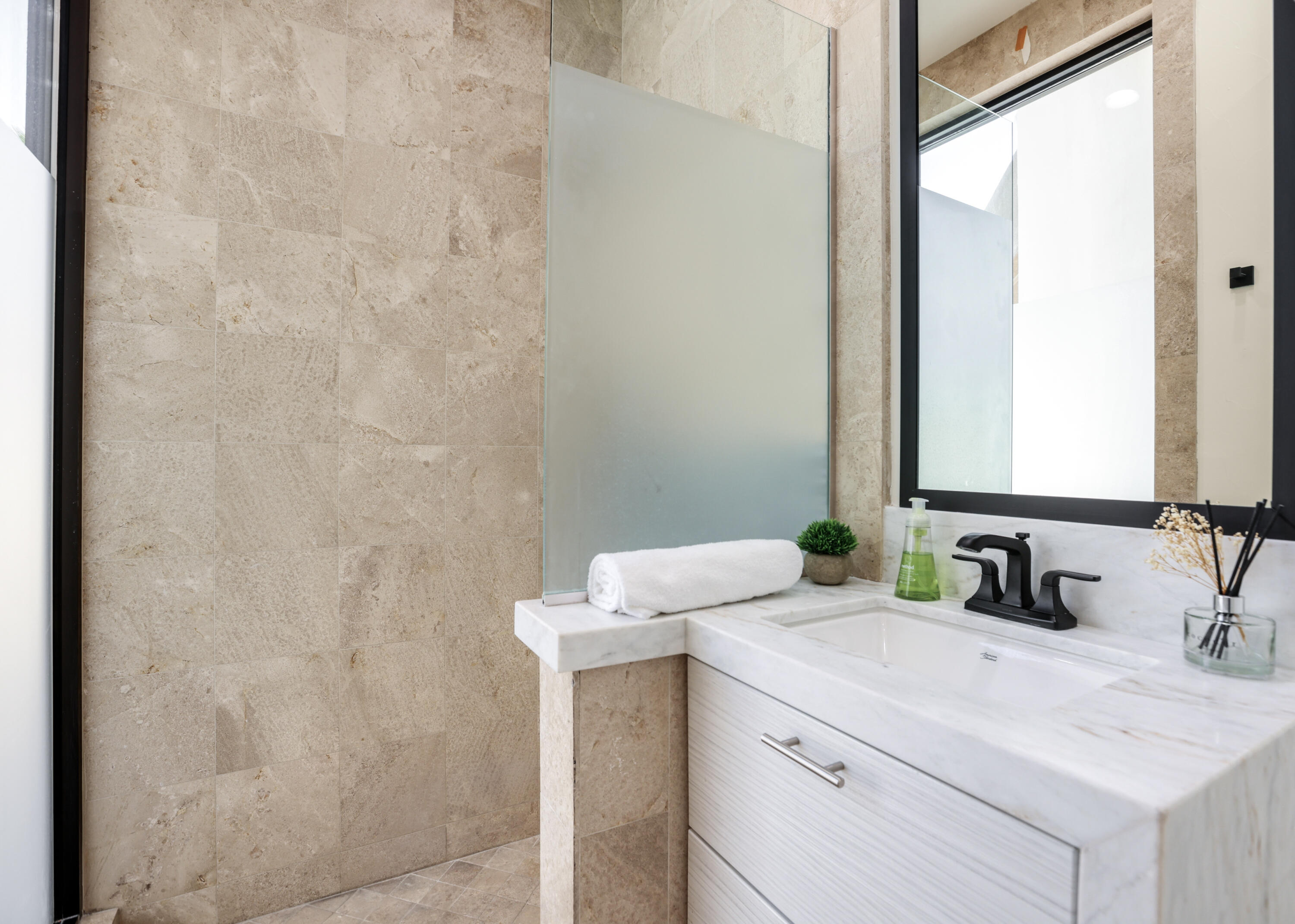 1 Seclude Court Rancho Mirage, CA 92270 - Photo 34 of 52 a bathroom with a sink and a mirror