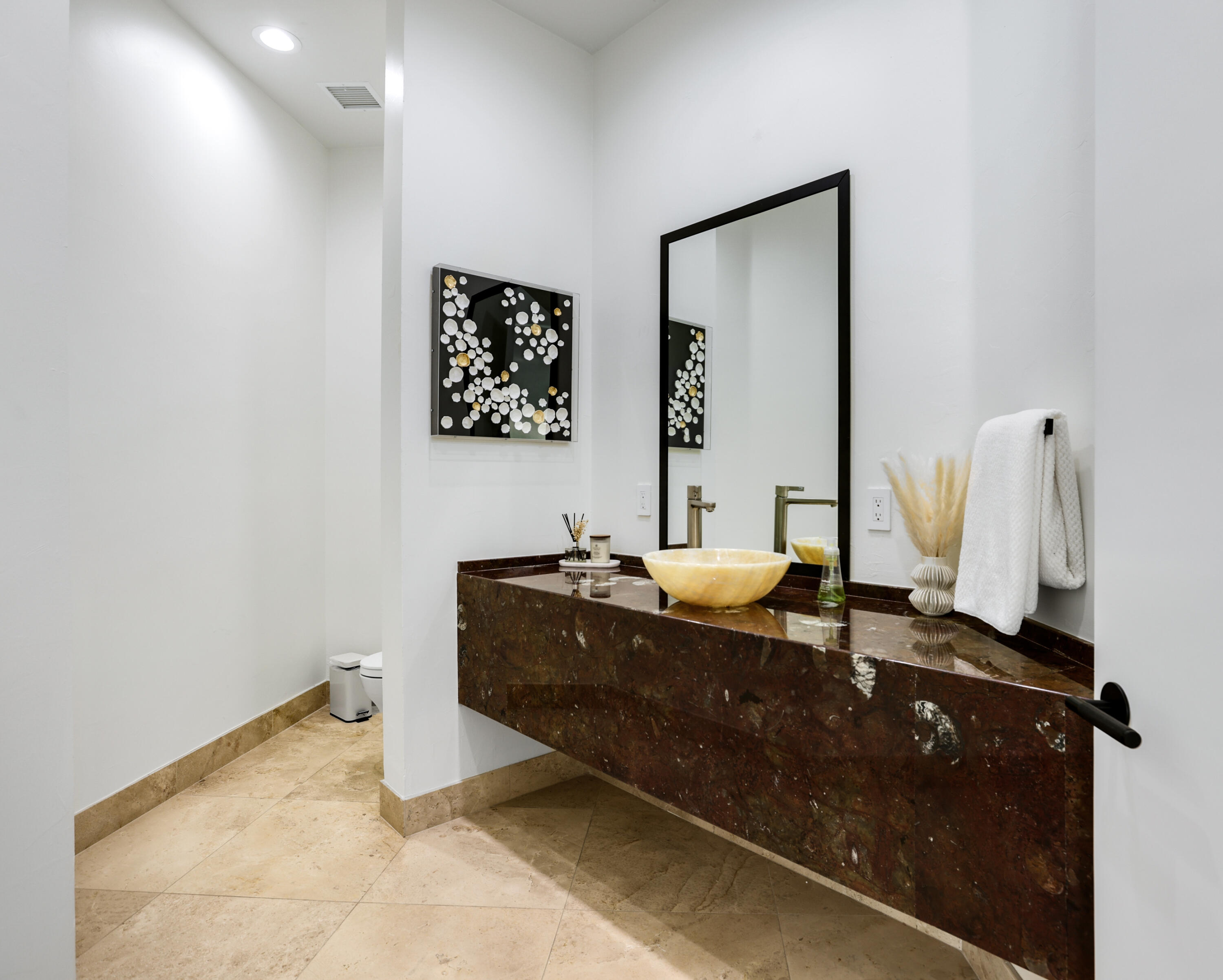 1 Seclude Court Rancho Mirage, CA 92270 - Photo 35 of 52 a bathroom with a sink and a mirror