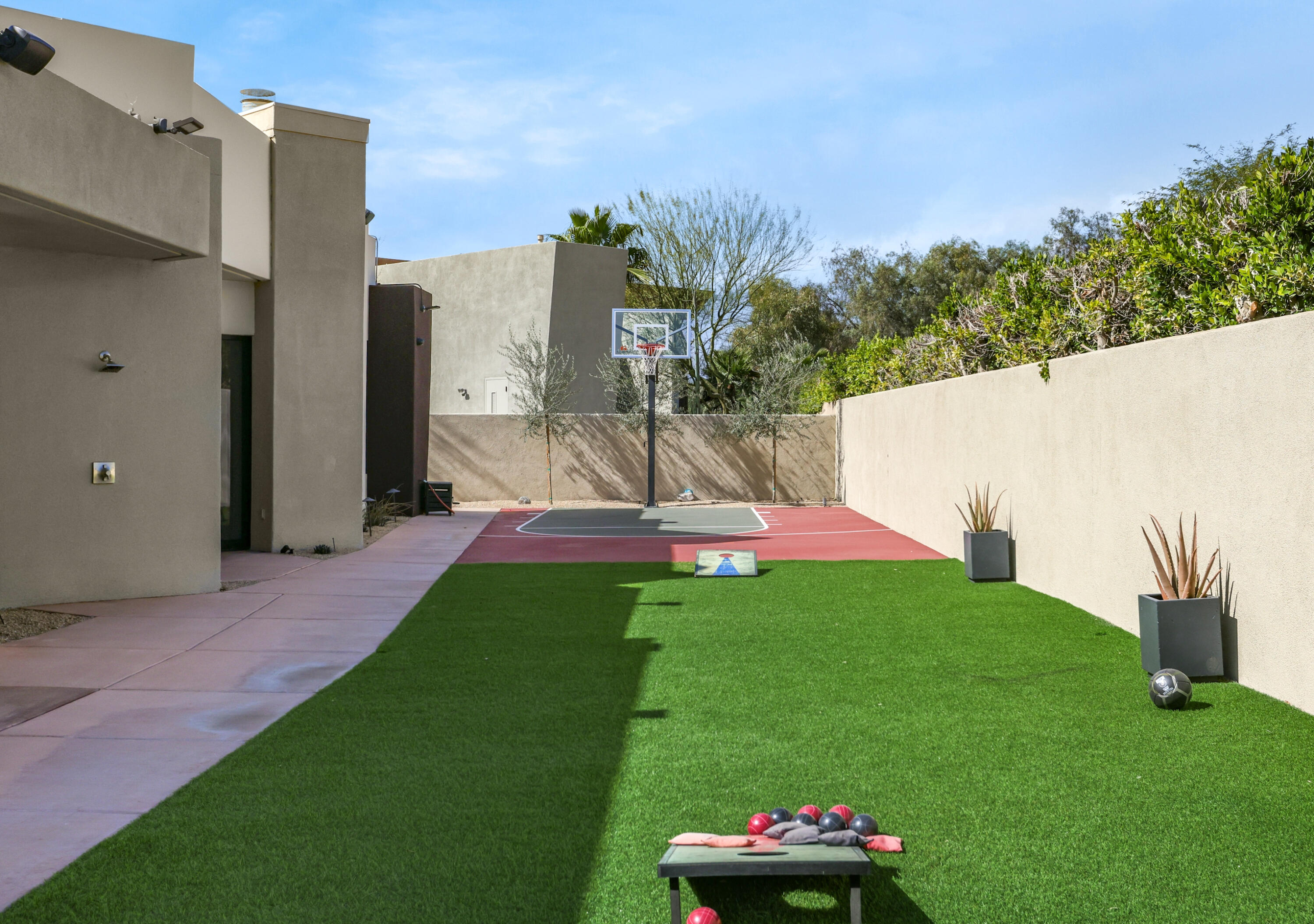 1 Seclude Court Rancho Mirage, CA 92270 - Photo 9 of 52 a front view of a house with a yard