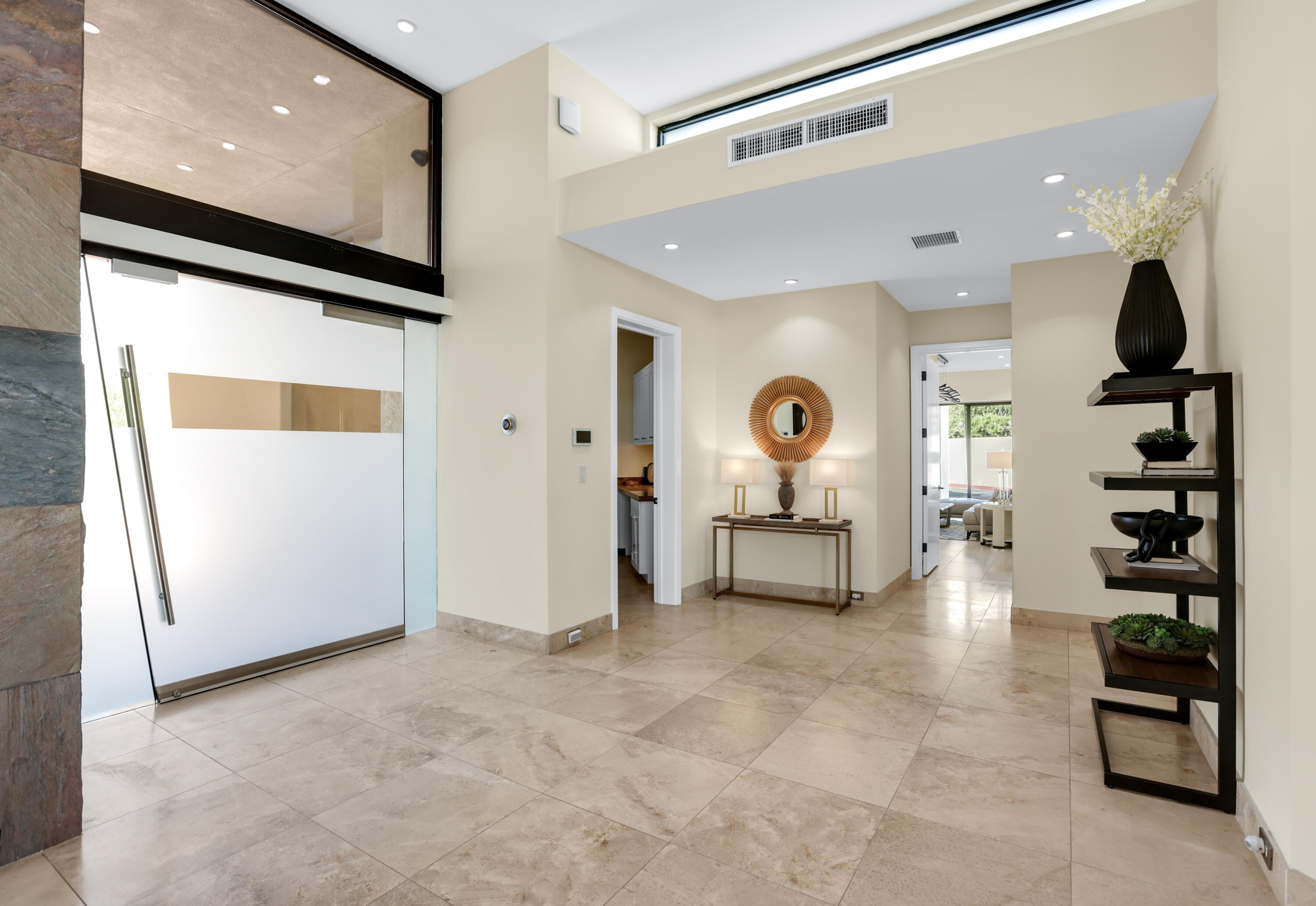 1 Seclude Court Rancho Mirage, CA 92270 - Photo 10 of 52 a living room with furniture and natural light