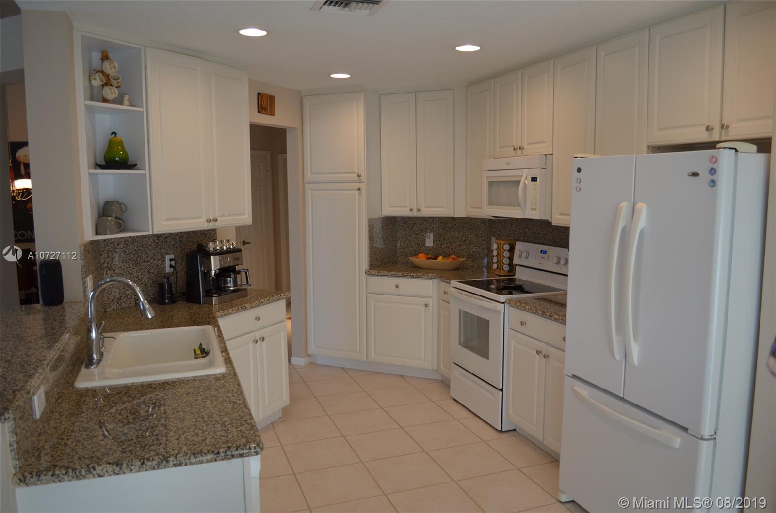 6334 Brava Way Boca Raton, FL 33433 - Photo 25 of 41 BEAUTIFULLY UPDATED KITCHEN