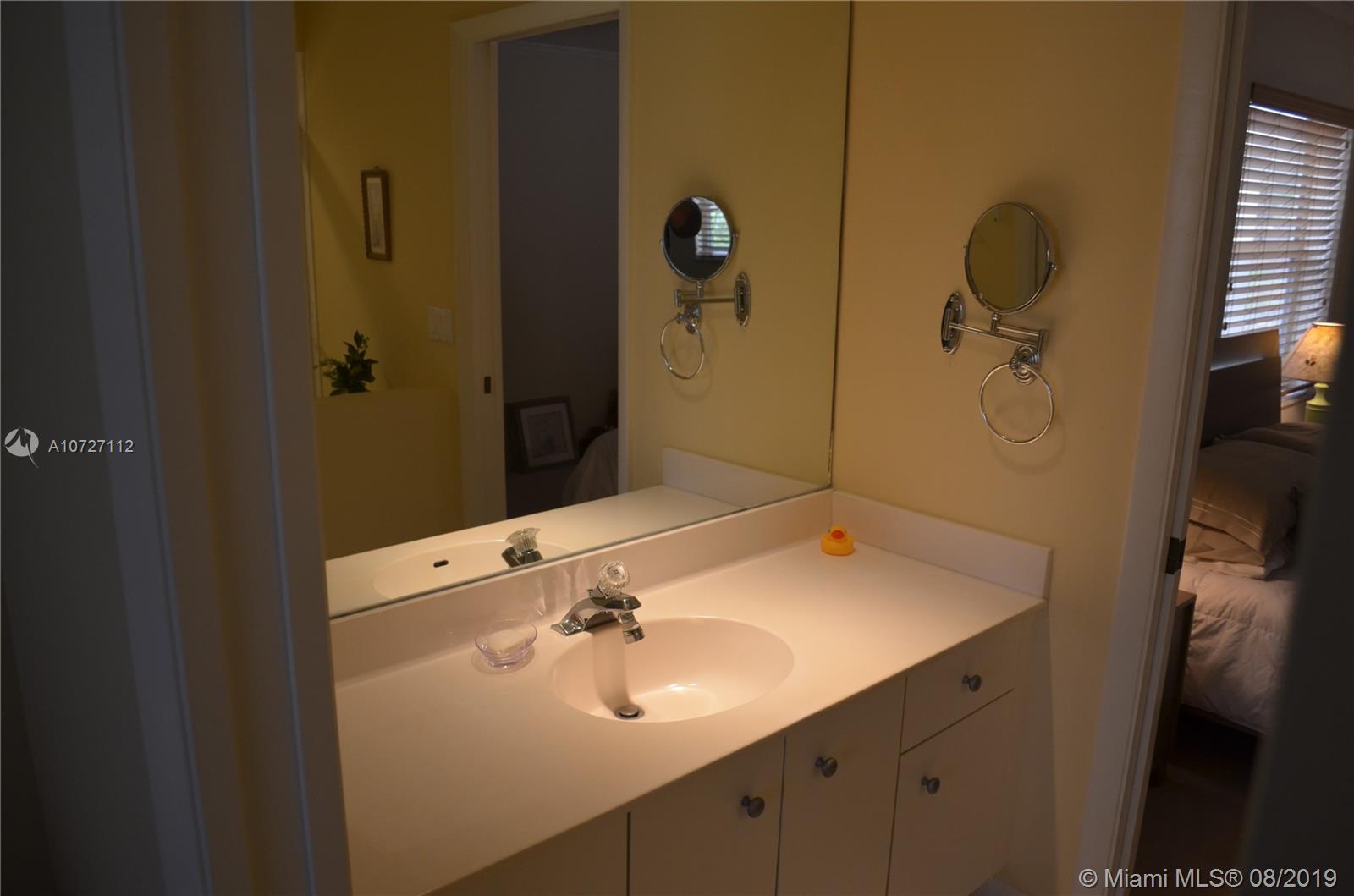 6334 Brava Way Boca Raton, FL 33433 - Photo 36 of 41 JACK AND JILL BATHROOM BASIN
