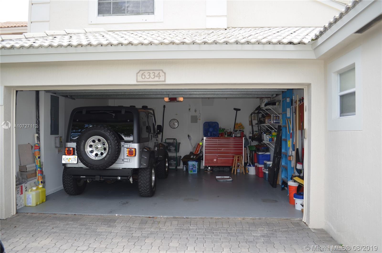 6334 Brava Way Boca Raton, FL 33433 - Photo 38 of 41 ENORMOUS GARAGE, PLENTY OF SPACE FOR TWO CARS AND MORE