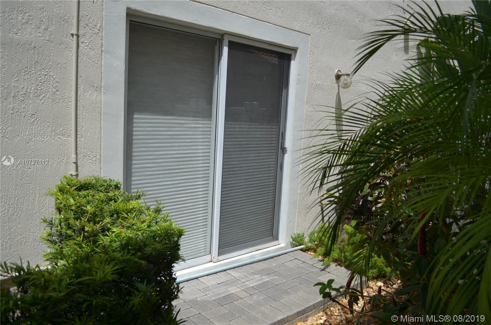 6334 Brava Way Boca Raton, FL 33433 - Photo 39 of 41 KITCHEN NOOK PATIO