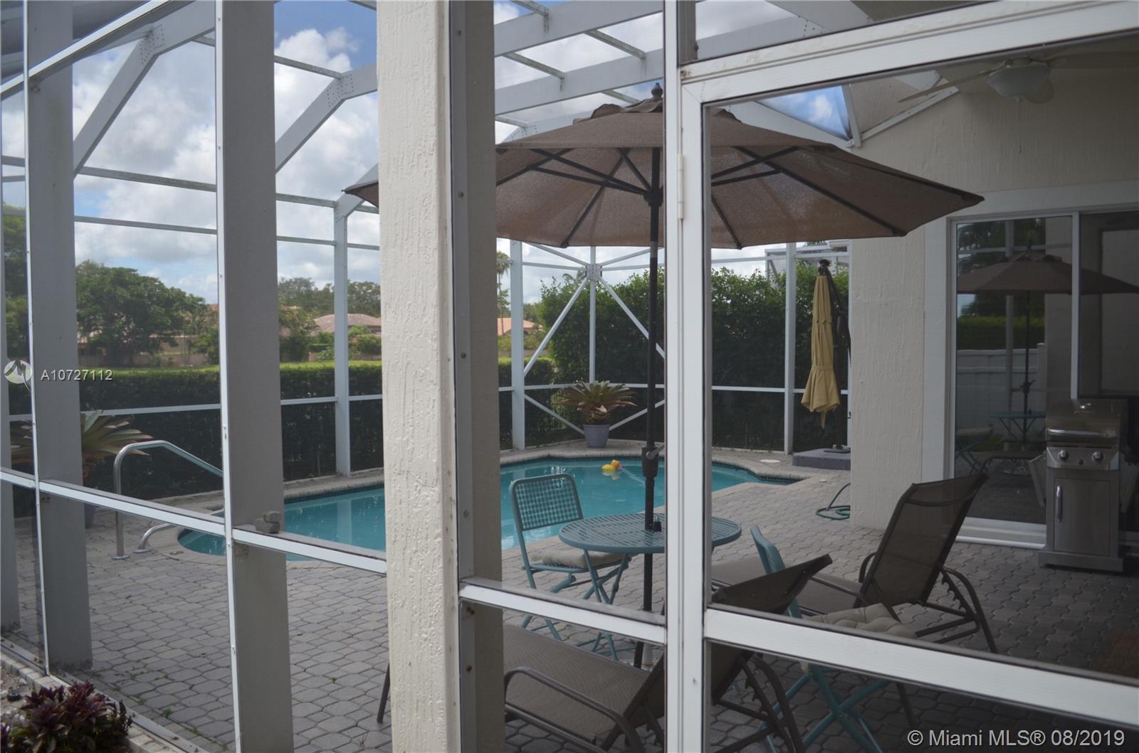 6334 Brava Way Boca Raton, FL 33433 - Photo 41 of 41 GORGEOUS AND PRIVATE SCREENED IN POOL, PERFECT FOR ENTERTAINING