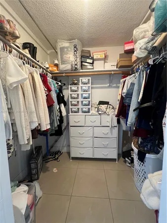 a bathroom with a sink toilet and mirror