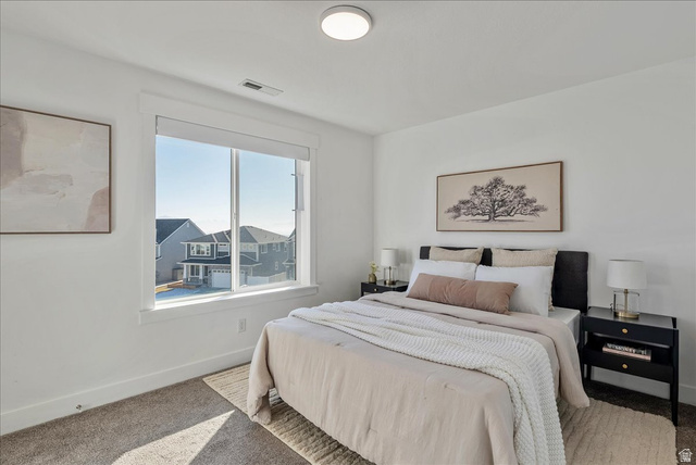 882 Spring Dew Lane Lehi, UT 84048 - Photo 35 of 46 Bedroom featuring carpet floors and baseboards
