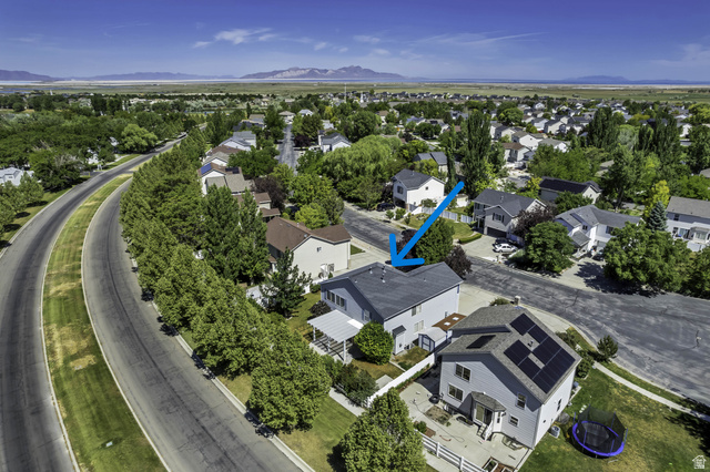 546 Wheatridge Road Tooele, UT 84074 - Photo 48 of 49 Residential area with established trees and streetscapes (blue arrow)