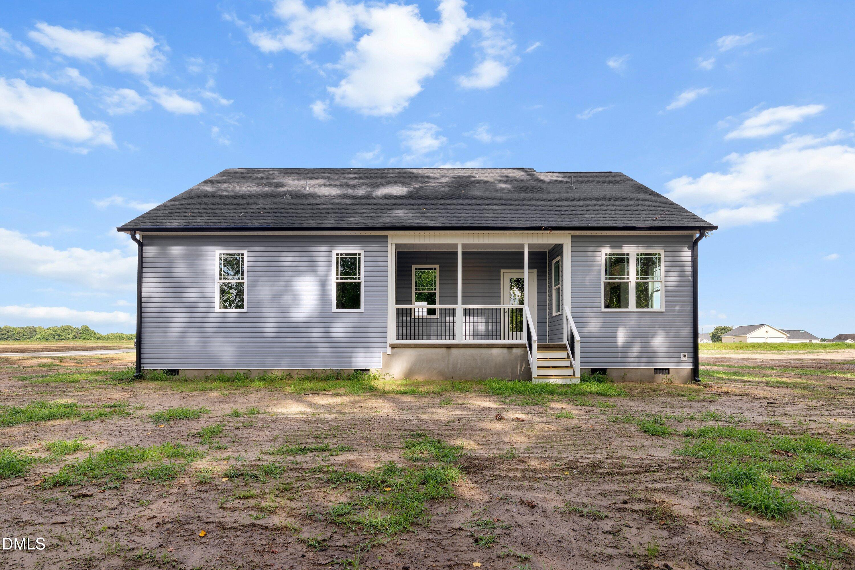 1115 Nor-Am Road Pikeville, NC 27863 - Photo 35 of 40 a front view of a house with a yard