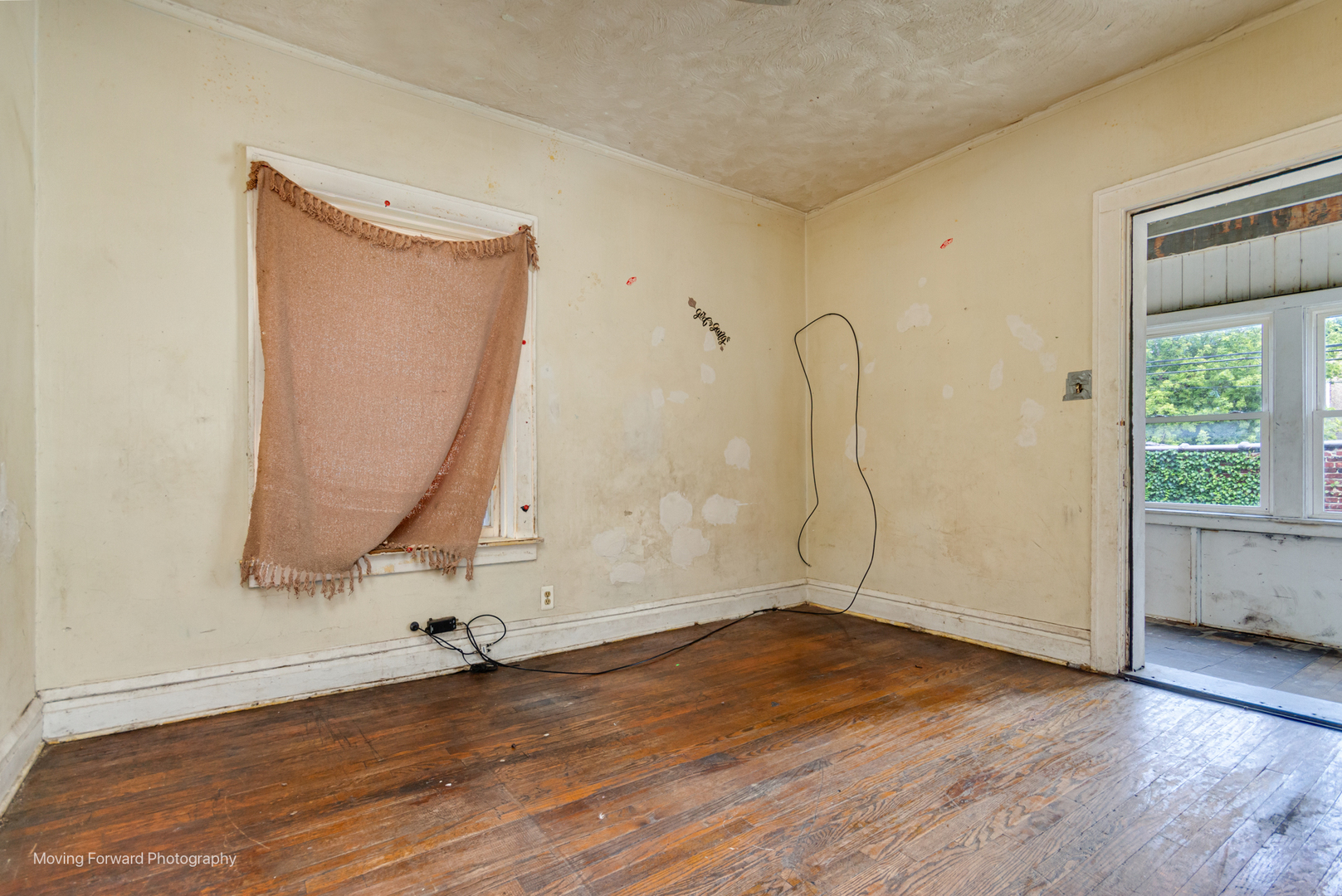 8153 South Sangamon Street Chicago, IL 60620 - Photo 19 of 37 a view of a room with wooden floor and window