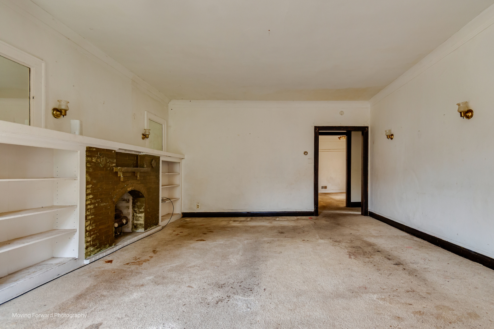 8153 South Sangamon Street Chicago, IL 60620 - Photo 22 of 37 a view of an empty room with a fireplace