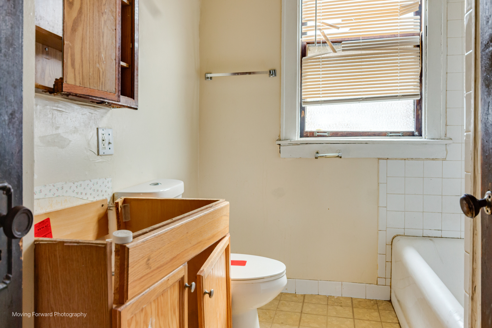 8153 South Sangamon Street Chicago, IL 60620 - Photo 31 of 37 a bathroom with a sink and a toilet