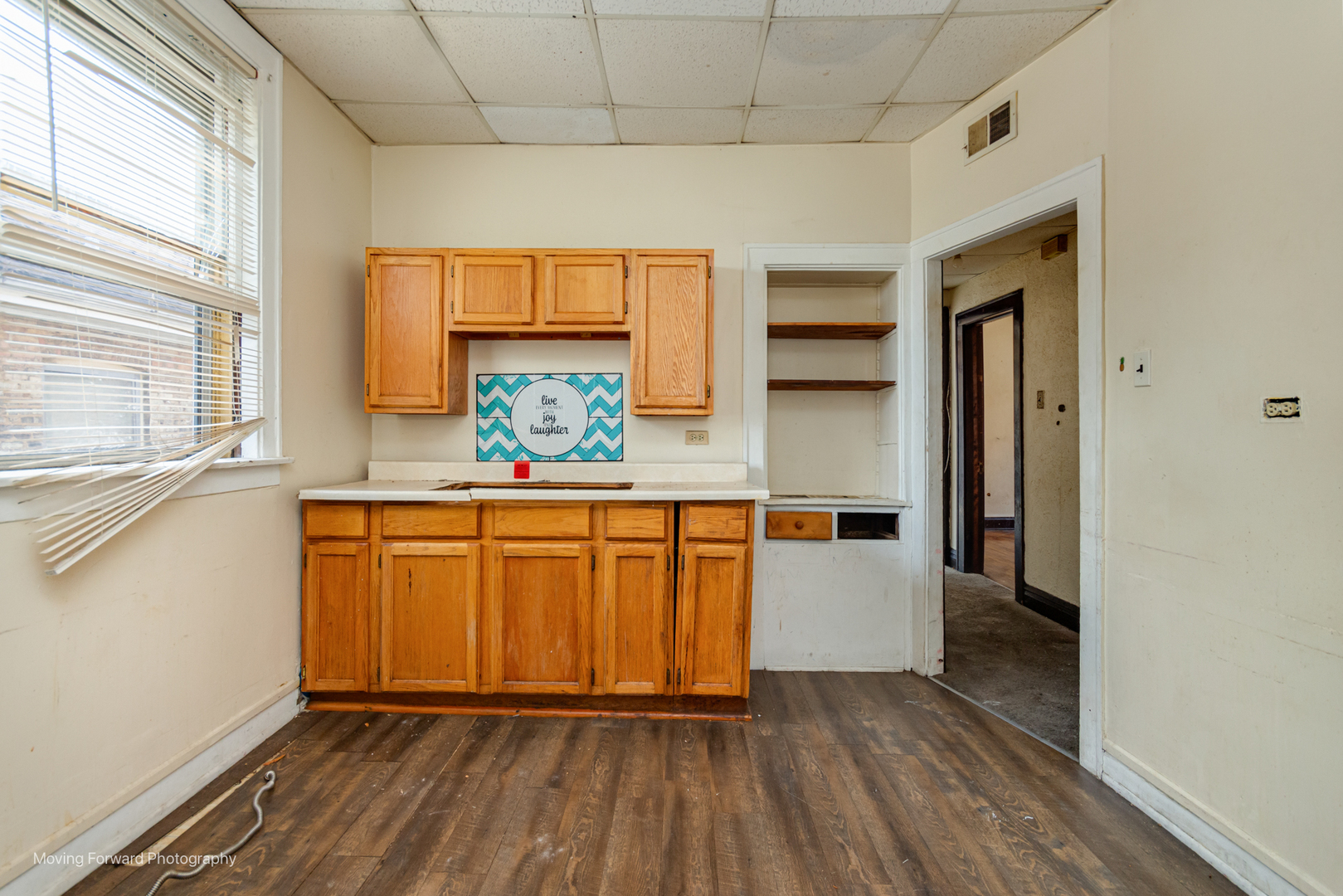 8153 South Sangamon Street Chicago, IL 60620 - Photo 33 of 37 a hallway with sliding door and wooden floors