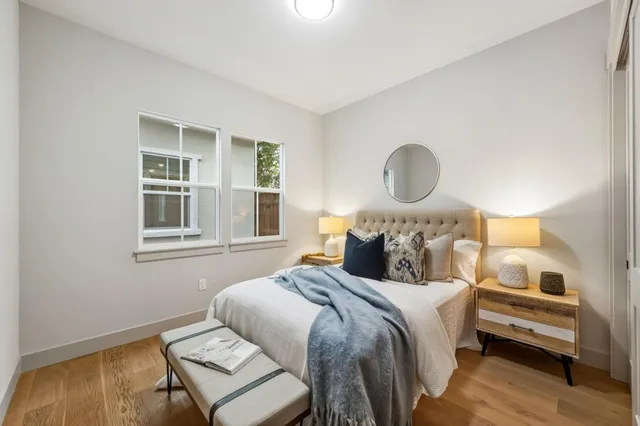 a bedroom with a bed and window