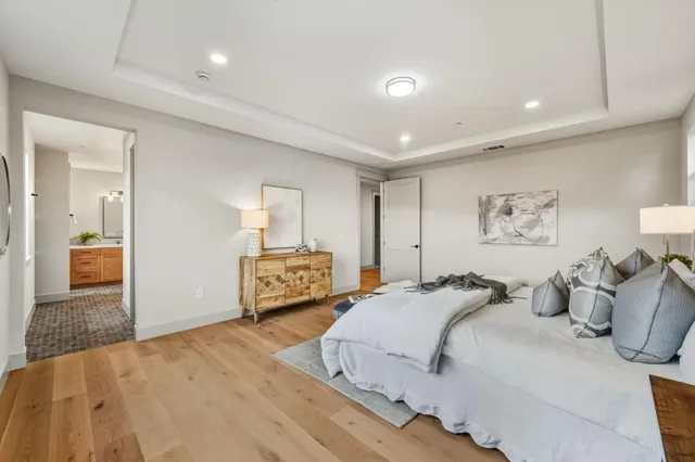 a bedroom with bed and window