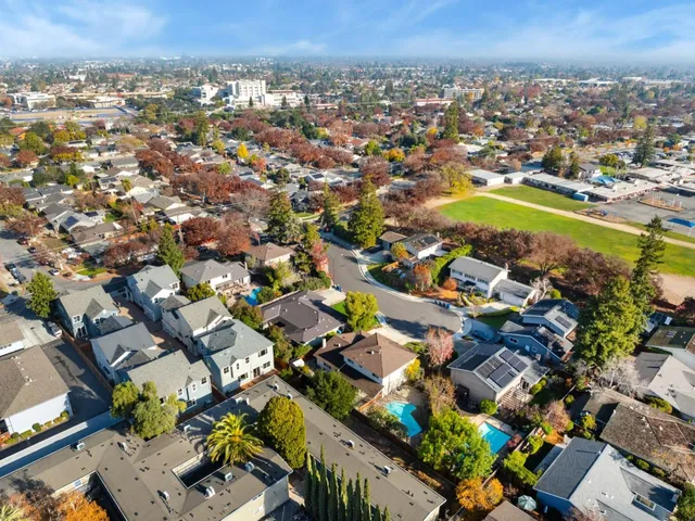 an aerial view of a city with lots of residential buildings