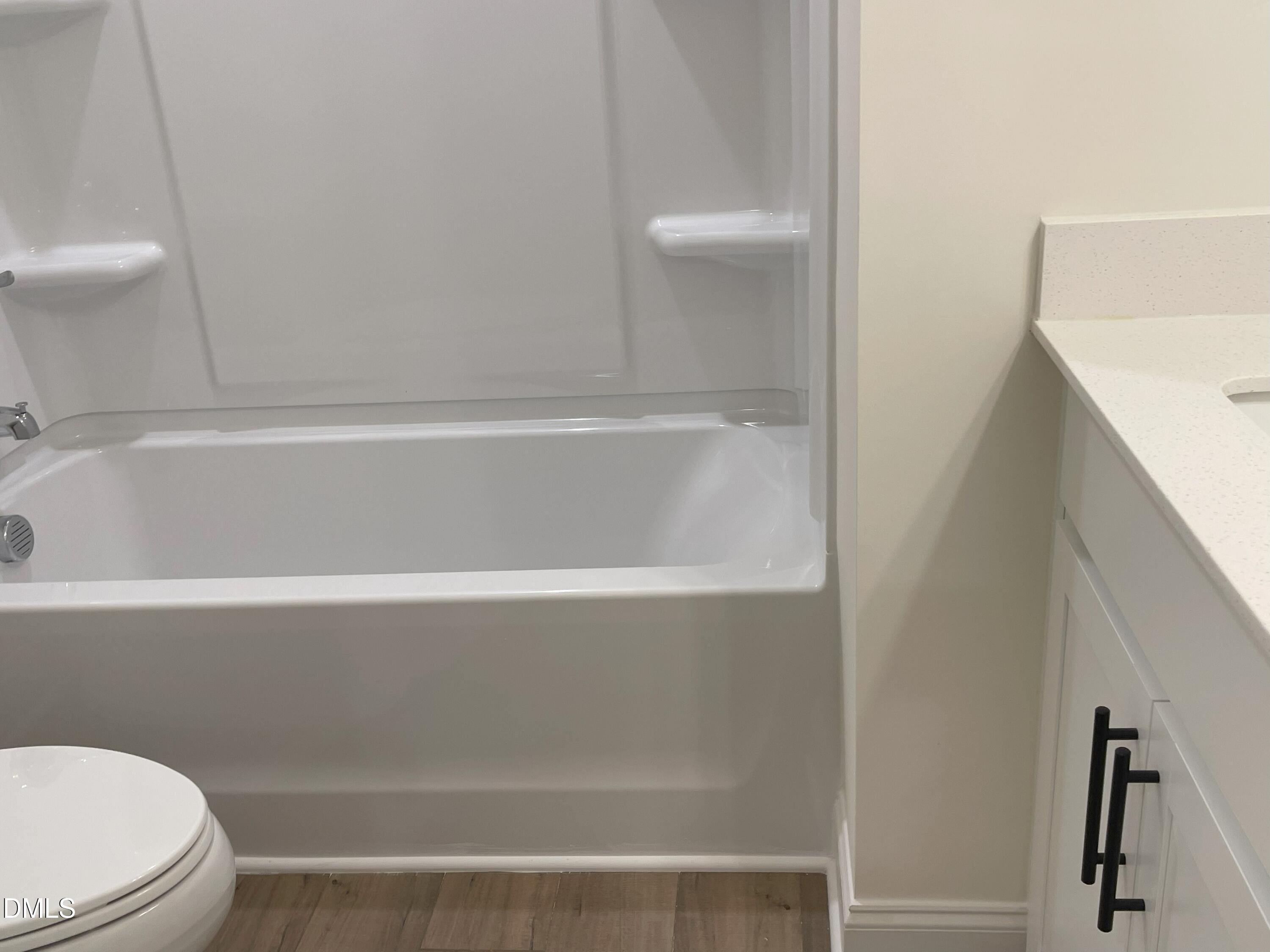 6404 Lady Eliza Lane Raleigh, NC 27610 - Photo 29 of 37 a bathroom with a shower and a toilet