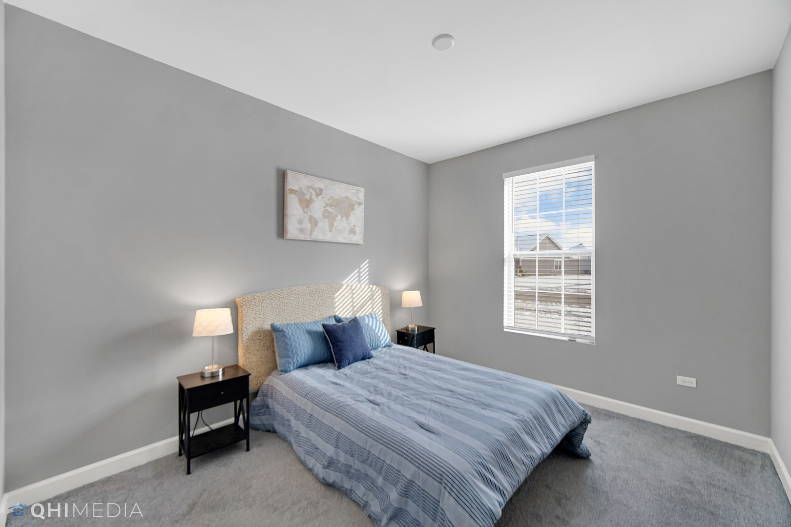 16432 Mueller Circle Plainfield, IL 60586 - Photo 16 of 22 a bedroom with a bed and a window