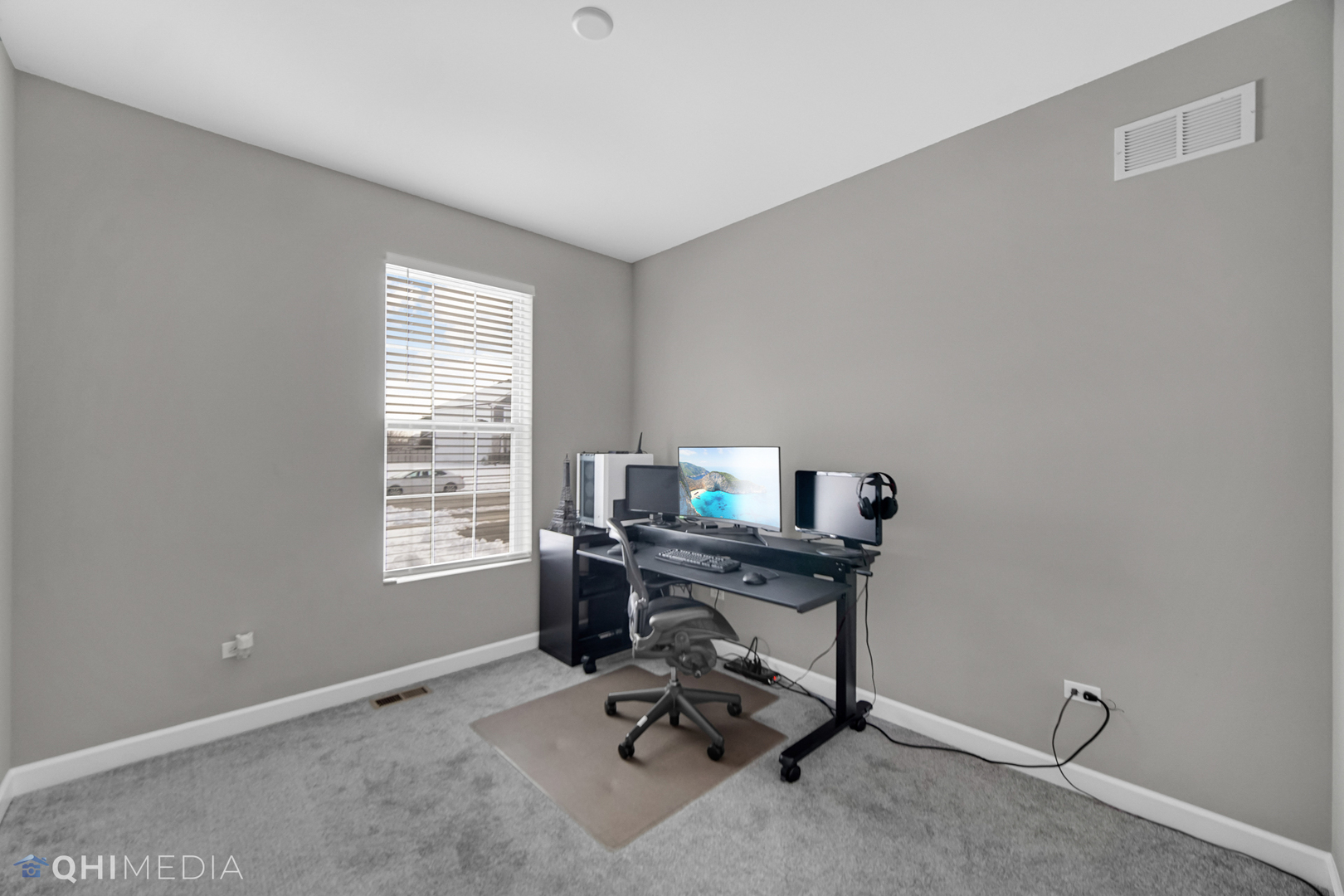 16432 Mueller Circle Plainfield, IL 60586 - Photo 18 of 22 a view of a workspace with a window