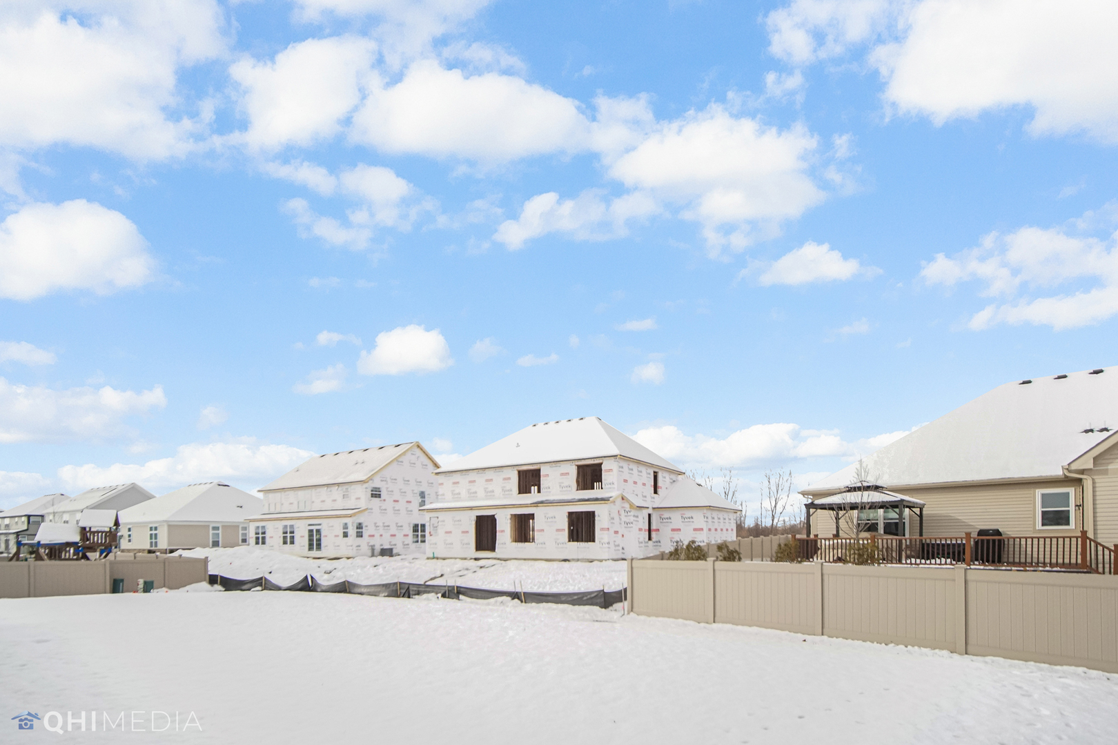 16432 Mueller Circle Plainfield, IL 60586 - Photo 20 of 22 a view of a house with a snow in the background