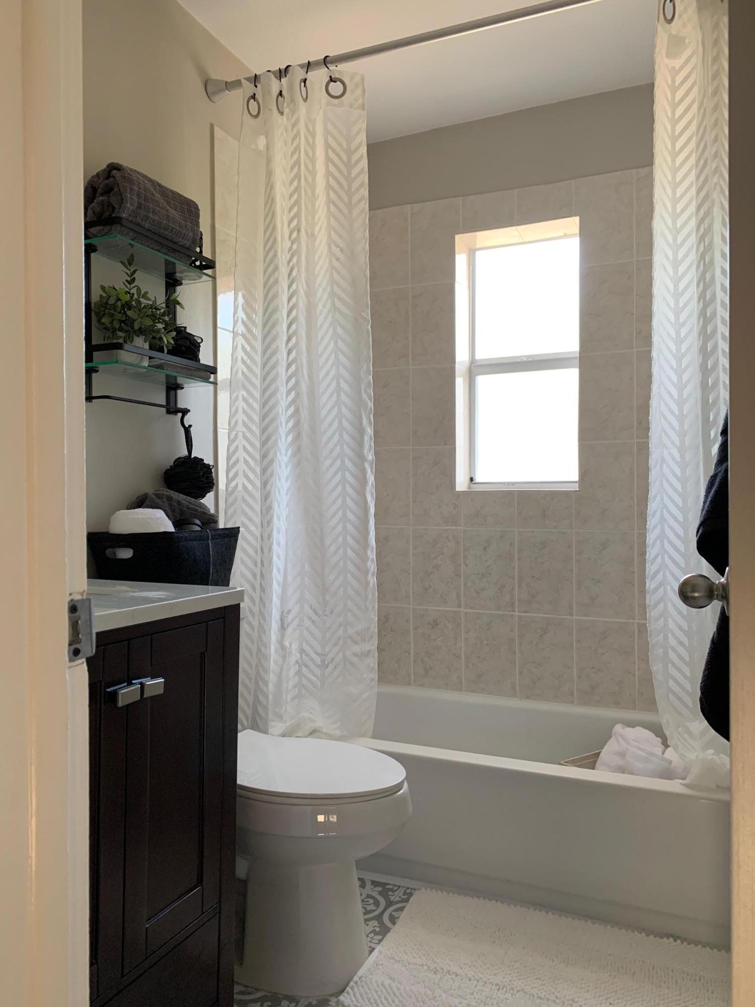 845 Cinnamon Road North Palm Beach, FL 33408 - Photo 19 of 24 Guest Bathroom