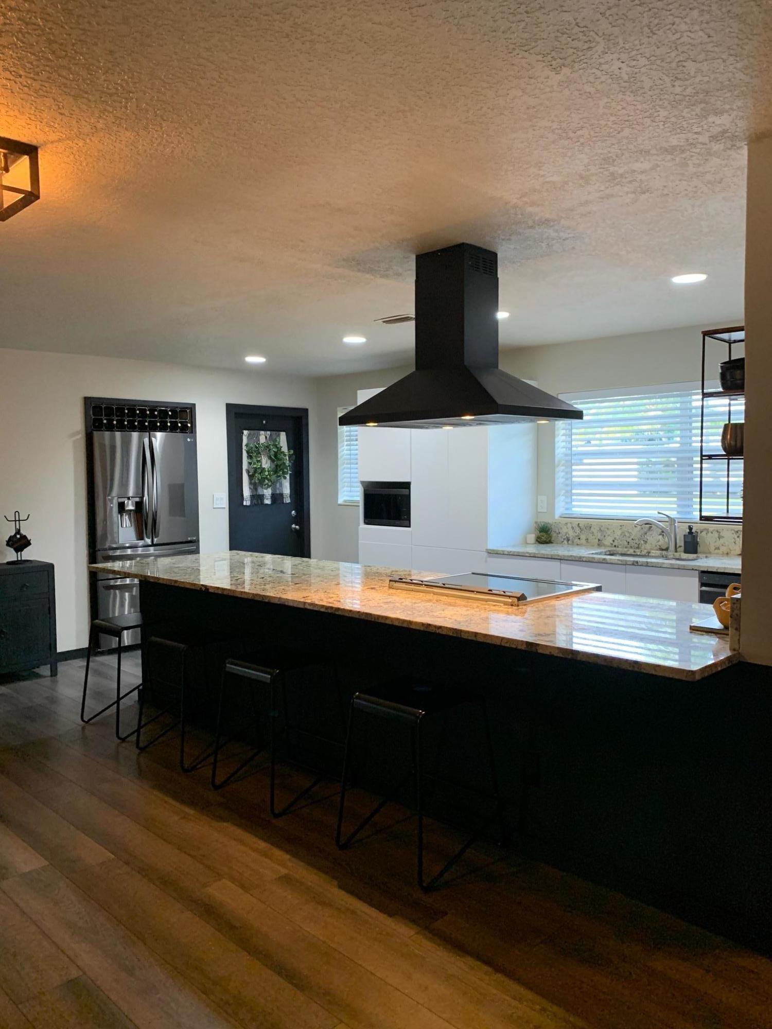 845 Cinnamon Road North Palm Beach, FL 33408 - Photo 5 of 24 Kitchen Hood