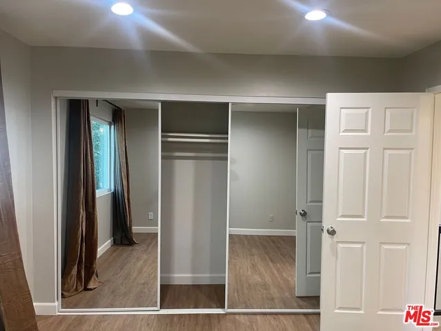 hallway with wooden floor